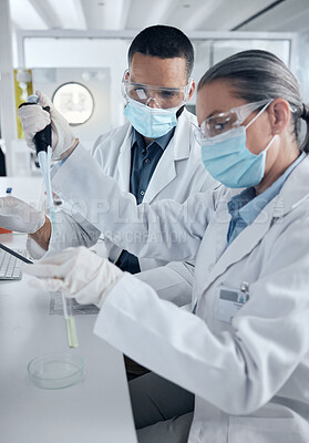Buy stock photo Covid, science and team of doctors working with vaccine research, medical or innovation analytics. Test tube, healthcare nurse or scientist with medicine, covid 19 or wellness in hospital lab