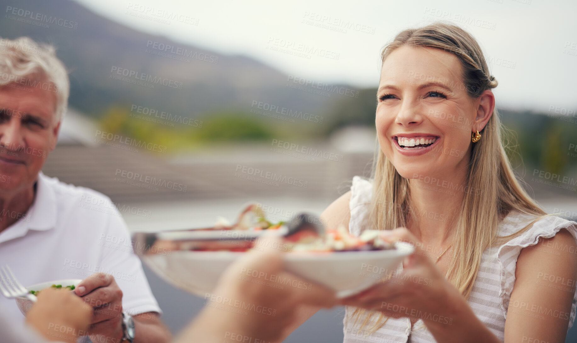 Buy stock photo Family, serving food and bonding and eating on holiday, vacation or celebration event in agriculture nature or countryside. Smile, happy and relax woman with senior parent, dad or man for health meal
