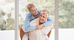 Happy senior couple in living room, love support in retirement and laughing happiness in marriage. Australia home with funny elderly man, hug senior woman with crazy trust and joke smile together