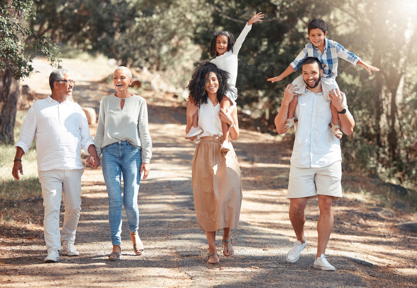 Buy stock photo Happy family, fun and freedom with laughing kids and playful grandparents bonding on a walk in a nature. Love, cheerful and relax with playful family enjoying an active walk in park, peaceful cardio