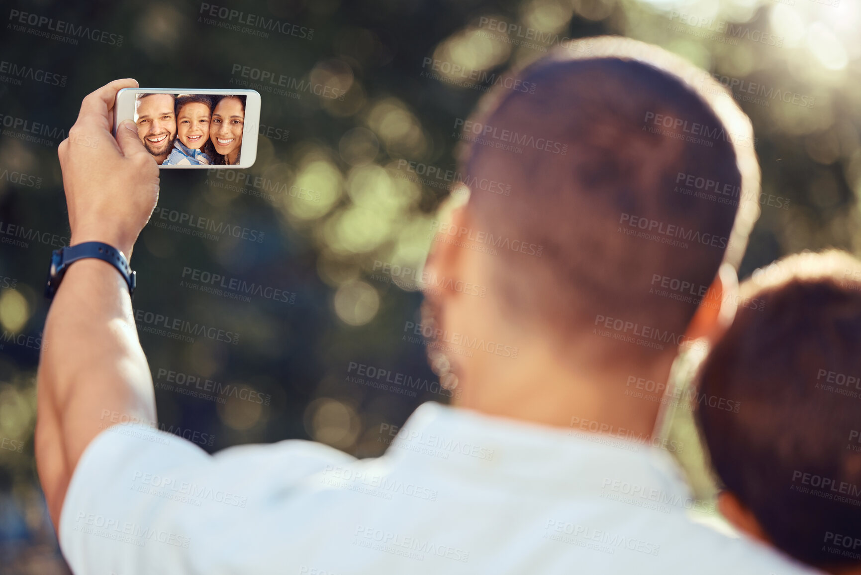 Buy stock photo Phone, screen and selfie with happy family in a park, bonding and taking a picture in nature together. Love, photography and parents enjoying outdoor time with their son, cheerful and carefree