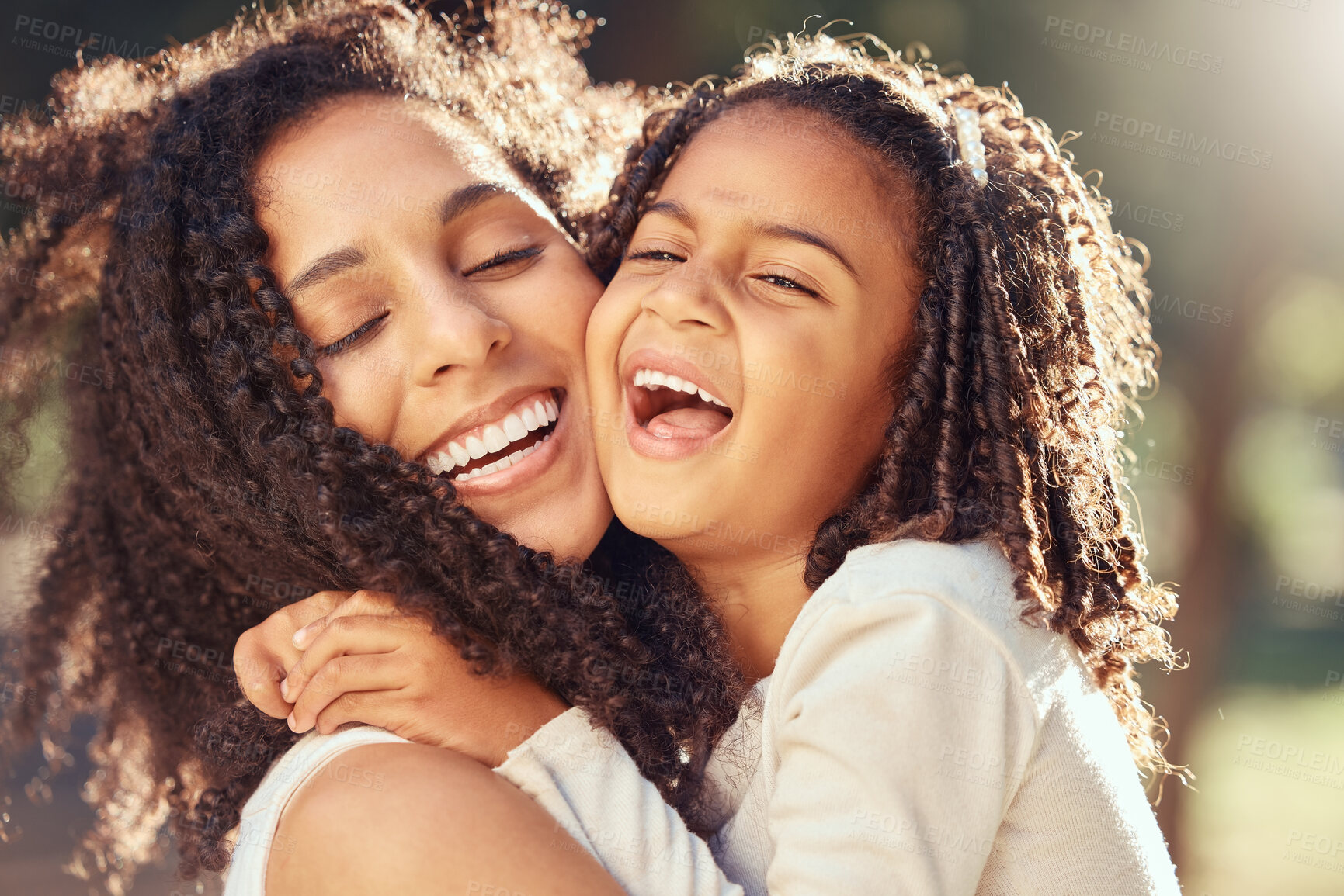 Buy stock photo Happy girl kid hugging mom for mothers day, love and relax at park outdoors for fun together in Colombia. Smile parent, laughing child and play for happiness, quality time and care in summer garden