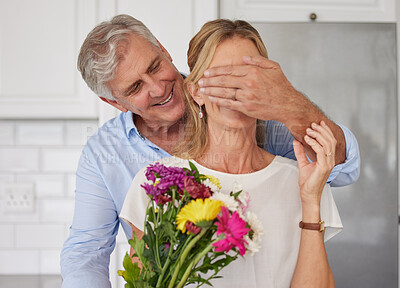 Buy stock photo Senior couple covering eyes for flowers surprise, anniversary love and valentines day in New Zealand home. Happy man giving bouquet to woman for birthday gift, present and celebrate romance together