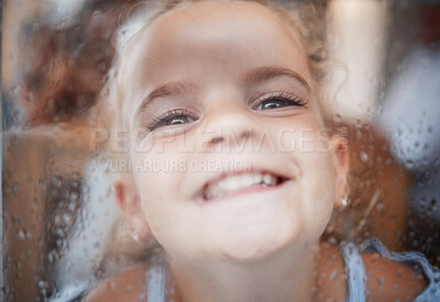 Buy stock photo Happy funny girl, face on window with flat nose on rainy glass and comic portrait at home. Young kid play joke, child alone with big smile and laughing crazy humor closeup in  San Francisco winter
