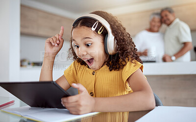 Buy stock photo Excited, homeschool tablet or girl with ideas, learning motivation or education innovation in homework study on headphones. Smile, happy and student child with technology in senior grandparents house