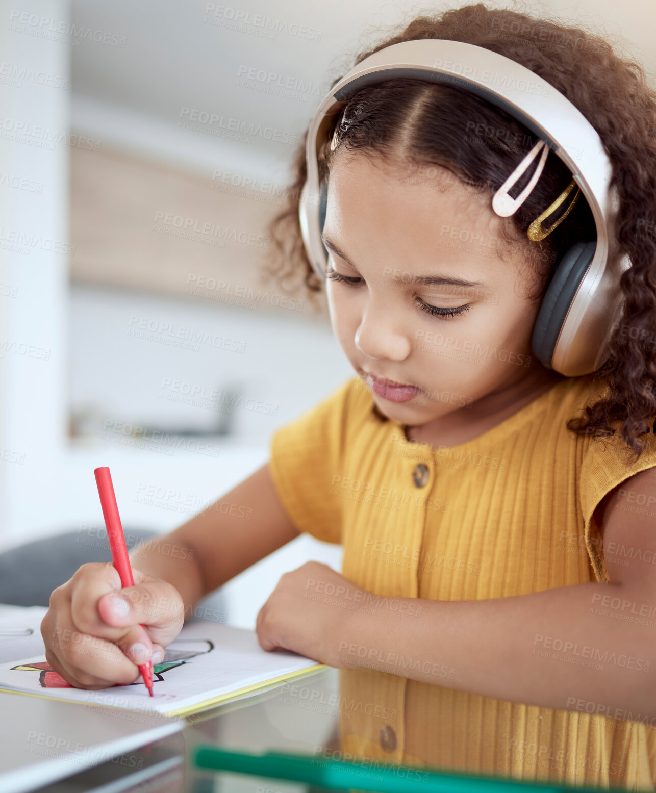 Buy stock photo Girl, home and music while drawing in book for homework, assignment or fun in home. Child, writing and notebook while creative with headphones for audio, radio or streaming with homeschool in house