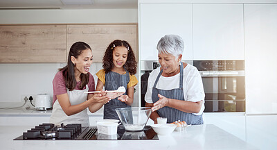 Buy stock photo Women in kitchen teaching girl baking cake or cookies for family. Happy grandmother, mom and young child learning with cooking ingredients in family home make snack, biscuit or flour while have fun
