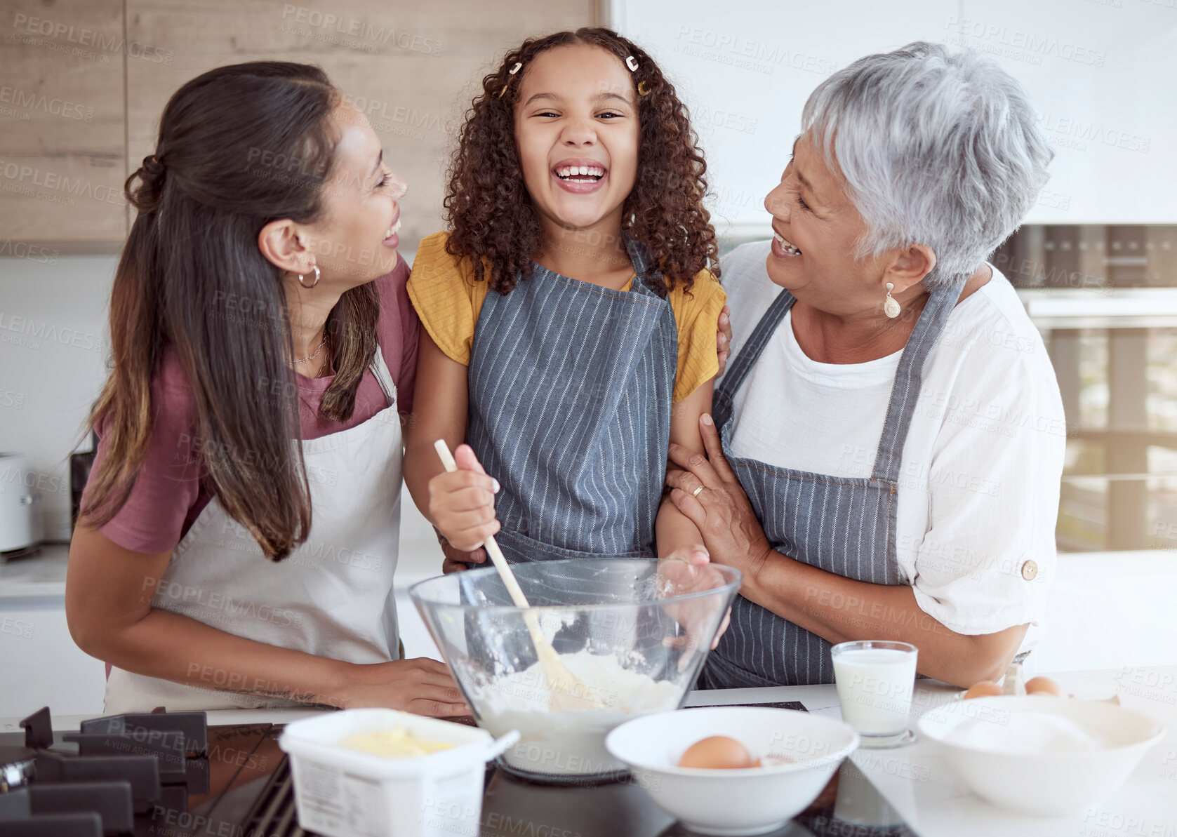Buy stock photo Happy family, cooking and learning with smiling girl bonding with her mother and grandmother in a kitchen. Love, teaching and baking by retired grandparent enjoying fun activity with child
