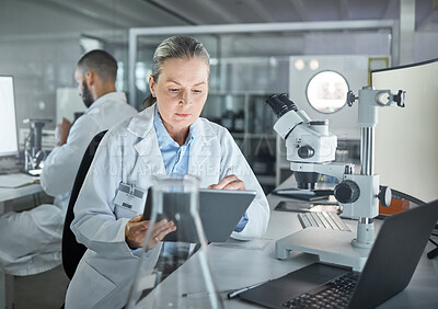 Buy stock photo Science woman, expert and tablet laboratory research, medical innovation and biology test online. Senior, focus and analytics scientist, physics worker and digital data planning for medicine analysis