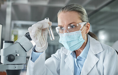 Buy stock photo Covid lab, medical science and scientist working on futuristic medicine research for healthcare at a pharmacy. Doctor doing an expert chemical test on liquid for innovation while at a hospital