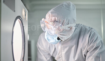 Buy stock photo Science, research and laboratory in ppe working dangerous material, virus or disease. Scientist, lab and clothes for safety focus while at work for analysis of bacteria, chemical or radioactive test