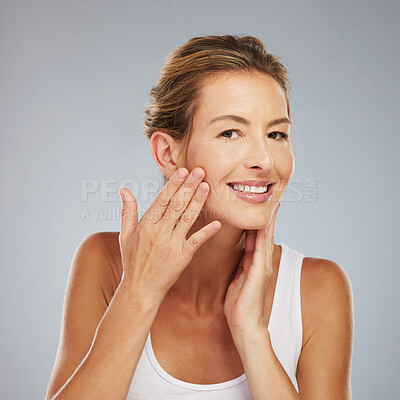 Buy stock photo Face, beauty and skin of woman with skincare and cosmetics with teeth and smile. Portrait of a happy model or elderly lady face makeup in wellness with healthy skin care in a grey studio background