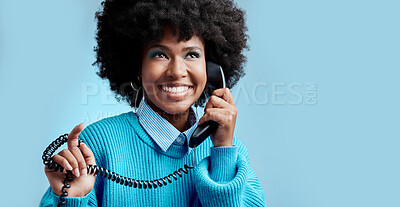 Buy stock photo Telecom landline, phone or black woman talking, communication on blue mockup studio background. Happy, smile or young African girl model speaking to contact on vintage phone with mock up space