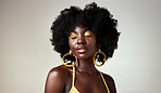 Black woman, face makeup and beauty eyes closed, thinking or fashion inspiration. African model, afro hair care and stylish, unique gold designer jewelry or cosmetics on gray mockup studio background