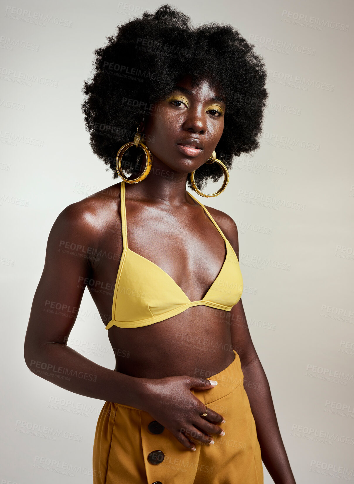 Buy stock photo Yellow fashion, makeup and beauty with a black woman model in studio on a gray background for a contemporary photo shoot. Cosmetics, accessories and style with an edgy female posing in trendy clothes