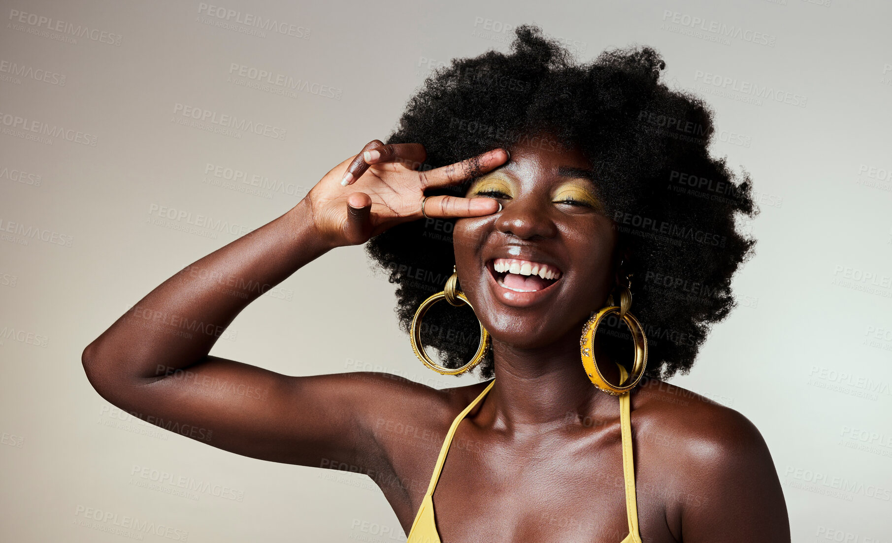 Buy stock photo Beauty peace sign, black woman with gold makeup on healthy skin and jewelry in mockup studio background. Portrait of happy model with afro, creative cosmetic designer backdrop and female empowerment 