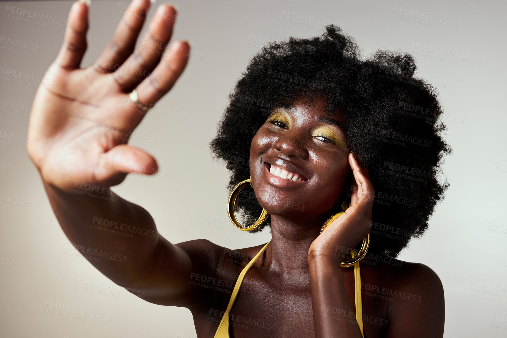 Buy stock photo Black beauty, hand and woman with yellow makeup, face cosmetics and eyes shadow for glamour. Good skin, afro hair and smile for portrait of happy African girl with vintage, retro and funk fashion