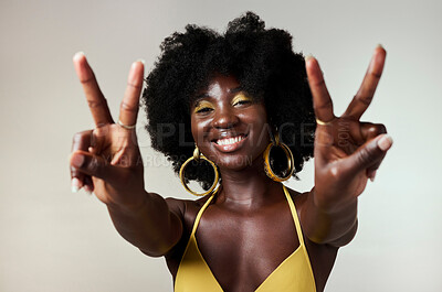 Buy stock photo Black woman, peace sign and fashion afro hairstyle on studio background with style, trend and makeup cosmetics. Portrait, fun or happy beauty model with playful and good energy hands gesture in Congo