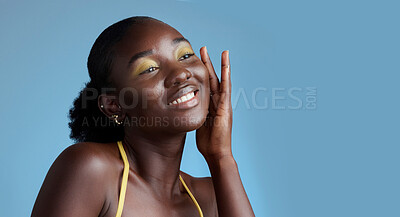 Buy stock photo Yellow makeup and black woman face beauty for skincare  cosmetic product with blue studio wall. Thinking, contemplating and pensive African girl feeling soft skin texture with eyeshadow mockup.