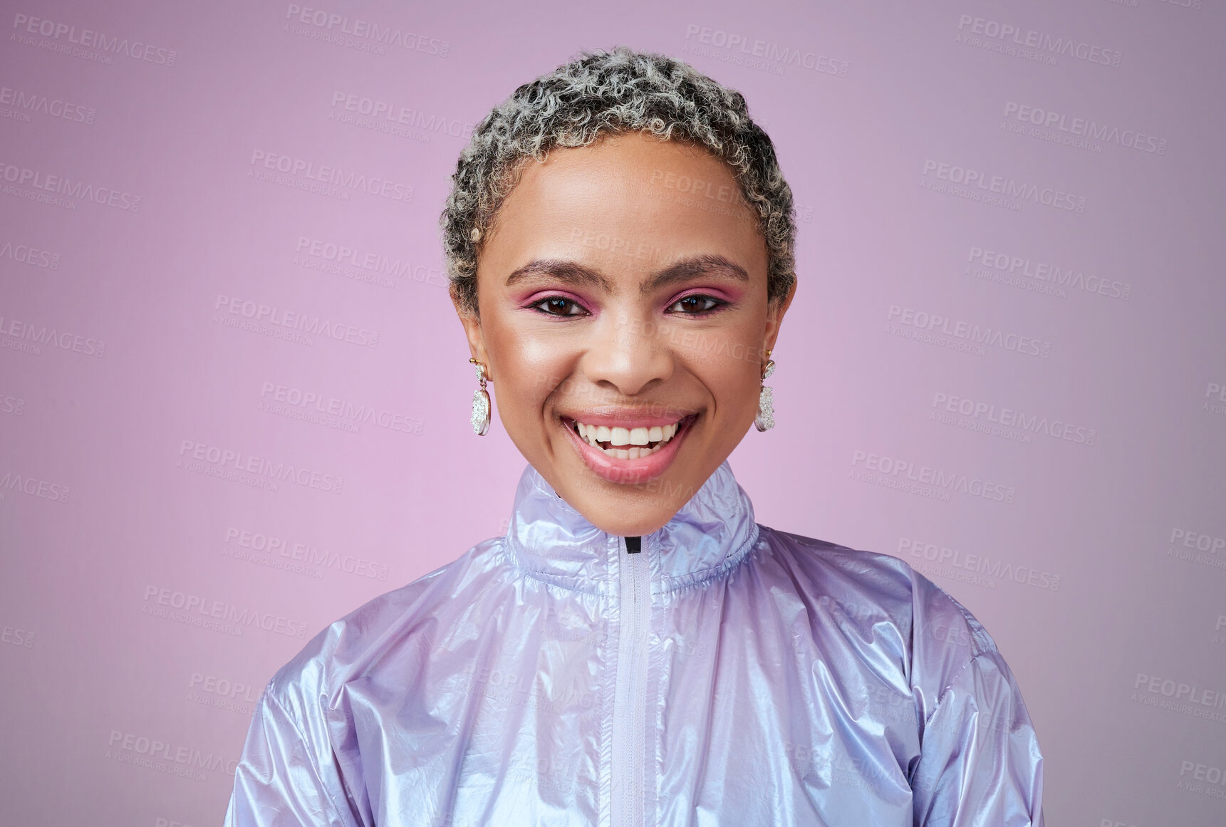 Buy stock photo Black woman, fashion and smile with holographic purple studio background with a happy, cosmetics and makeup for retro style. Face beauty portrait of an African female looking trendy with vaporwave 