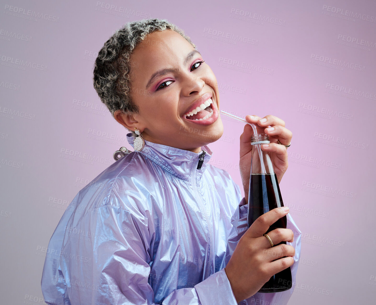 Buy stock photo Happy, smile and black woman with soda drink to refresh, relax and enjoy cool beverage with straw. Vintage, happiness and portrait of young retro girl with bottle of fresh liquid on purple background