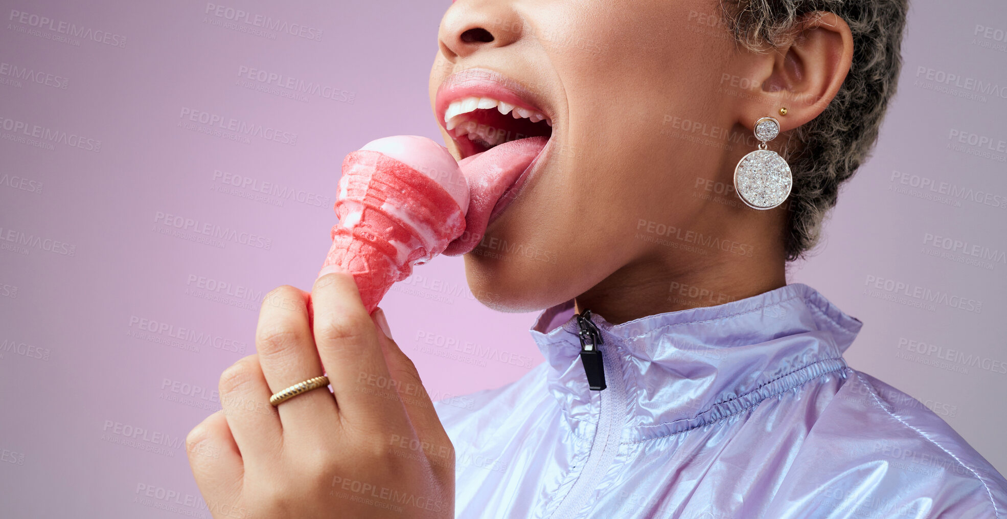 Buy stock photo Woman, ice cream and mouth while eating pink dessert with cone against studio background. Model, zoom and lick sorbet, snack or gelato for taste in summer with professional backdrop in Los Angeles