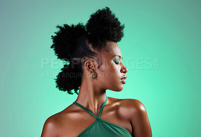 Buy stock photo Black woman, green makeup and face on skin for beauty, fashion and cosmetics against backdrop. Model, girl and hair, show afro, eyeshadow and lips in portrait with studio background in New Orleans