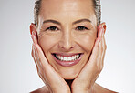 Face beauty, skincare and mature woman with smile for dermatology and makeup against grey mockup studio background. Portrait of an elderly model happy about facial skin wellness and care for body