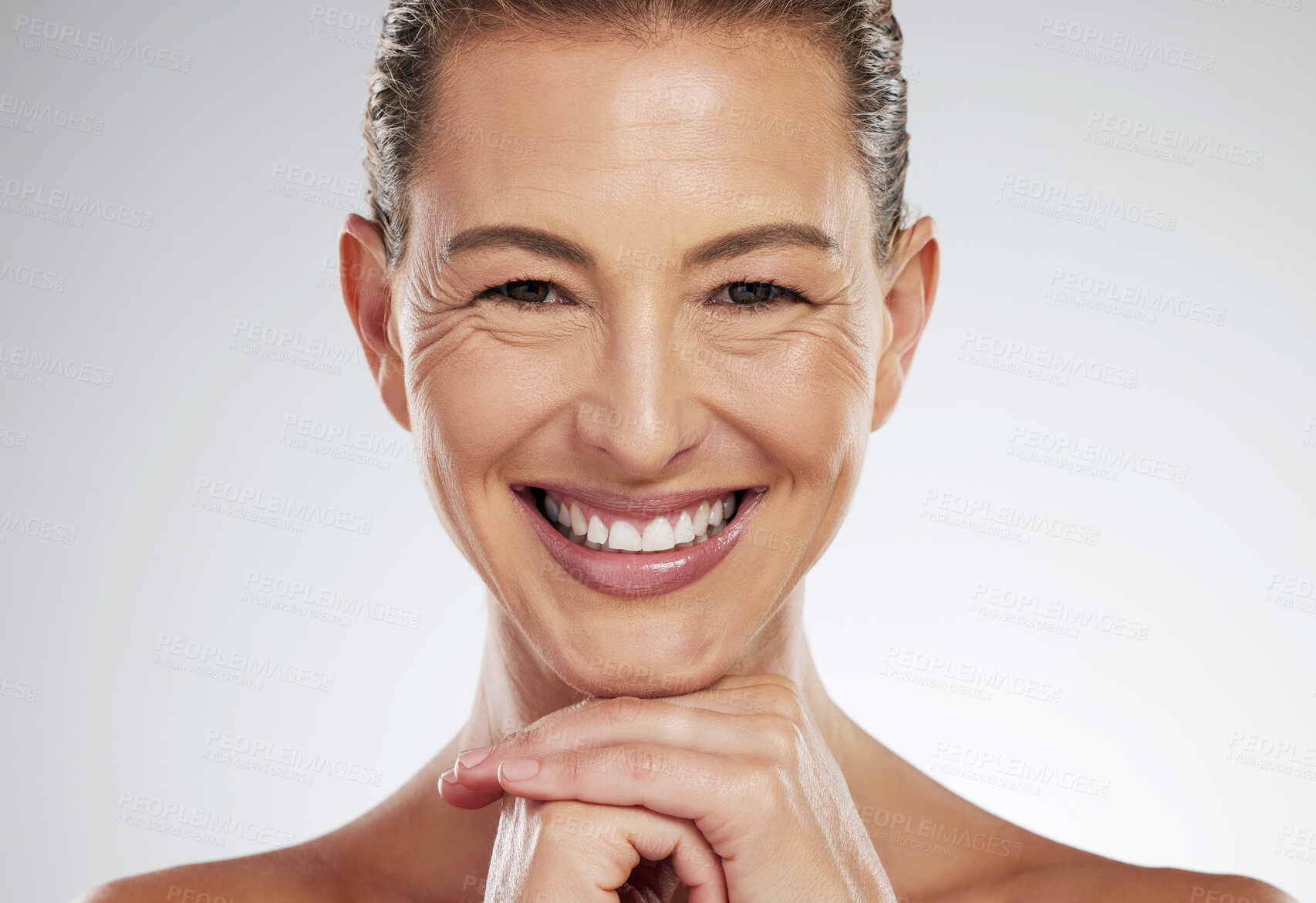 Buy stock photo Skincare, anti aging and beautiful mature woman with a smile on her face on white background. Beauty, botox and collagen, a middle aged lady from USA with health, wellness and wrinkles on clean skin