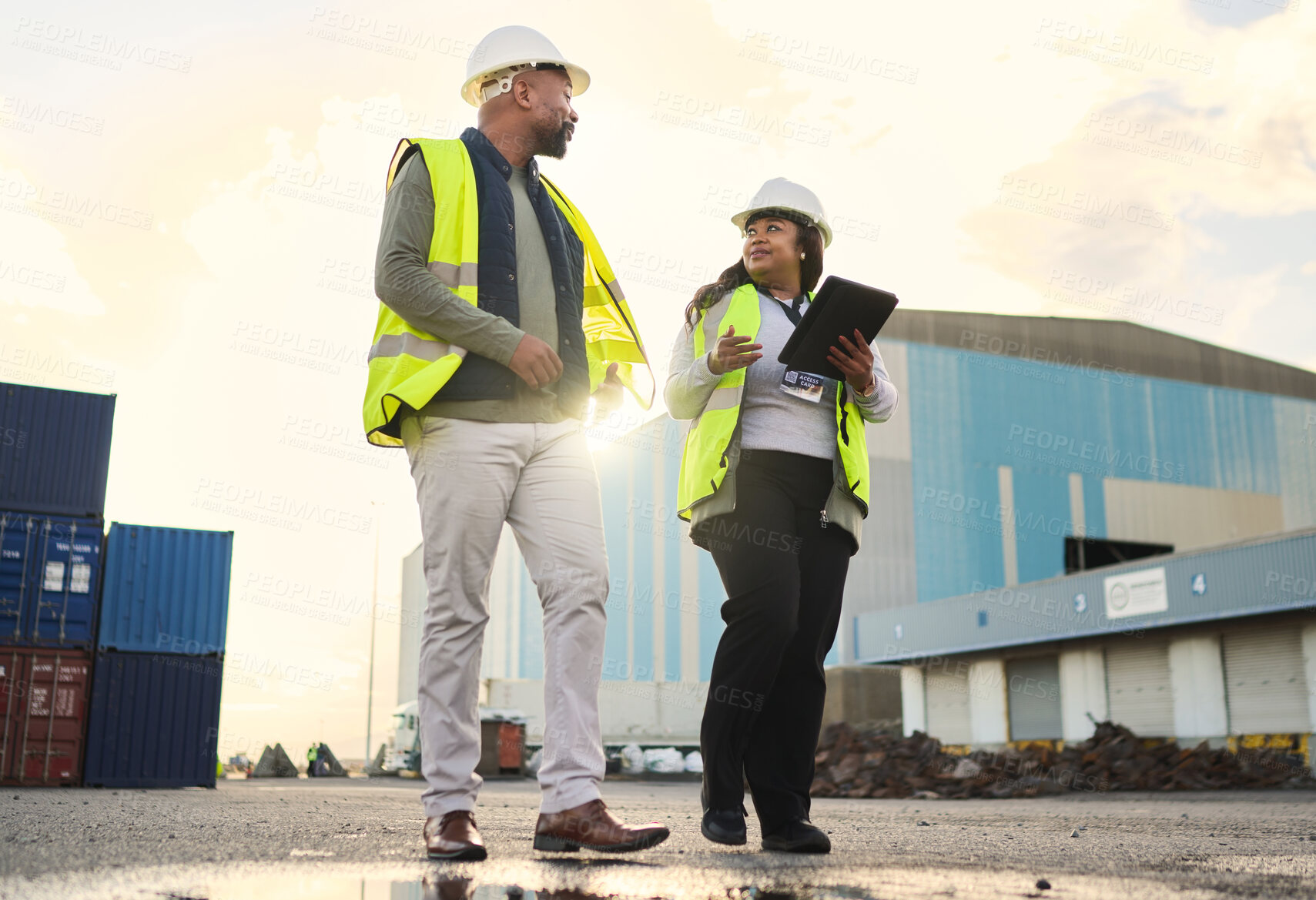 Buy stock photo Logistics, black woman and delivery manager at a warehouse for cargo shipping, inventory and distribution. Collaboration, teamwork and industry worker in a conversation on stock inspection report 