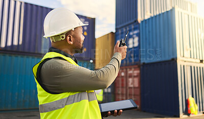 Buy stock photo Logistics, supply chain and shipping with a man, tablet and radio to plan delivery and shipment of container. Stock, cargo and freight worker on a commercial dock for export and import distribution
