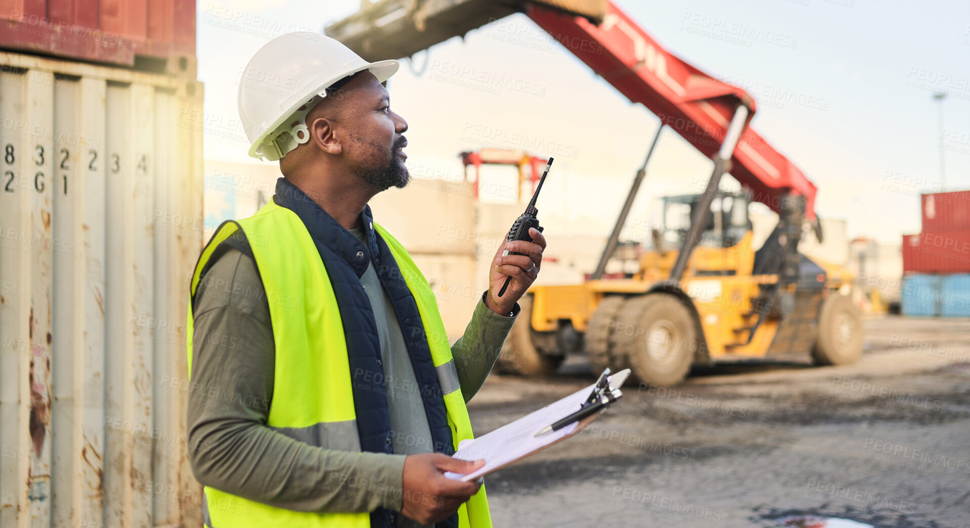 Buy stock photo Black man engineer, checklist and container manager  planning distribution, shipping and delivery logistics. African supply chain stock and cargo worker on walkie talkie for freight industry business