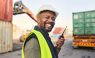 Buy stock photo Logistics, communication and black man talking on walkie talkie while working at a storage port with container. Portrait of an African manufacturing manager speaking on tech while shipping cargo