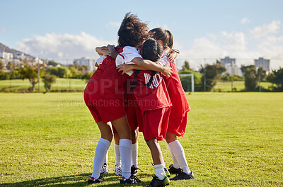 Buy stock photo Children, football team and huddle of sports group together on soccer field for celebration of goal, winning and teamwork during a competition match outdoors. Youth, kids or girls before a tournament