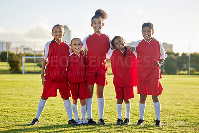 Buy stock photo Girl team, kids on soccer field and sports development for happy girls in group portrait together. Teamwork, football and proud female children from Brazil on grass before football game or training.