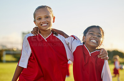 Buy stock photo Girls, hug and soccer team in fitness game, kids workout and training on grass field, nature park or Thailand high school stadium. Portrait, smile or happy football children in energy sports exercise