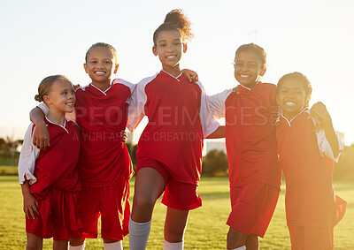 Buy stock photo Girl team, kids group portrait on soccer field and happy girls together. Teamwork, football and diversity, proud female kids from Brazil pose on grass, fun friends and playing football game at sunset