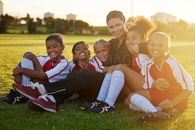 Buy stock photo Soccer, team and children on sports field with coach for training, football event or learning sport. Portrait of teacher and fitness students with smile and happy about partnership for competition