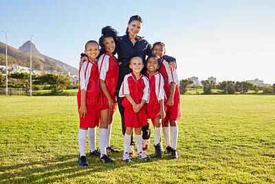Buy stock photo Team, soccer and coach smile on field together in portrait after training, game or workout in sun. Football, girl and woman with diversity in happy sports group on grass for teamwork in Cape Town