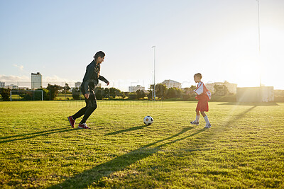 Buy stock photo Fitness, soccer and coaching with girl and sports training with ball in park for goals, support and workout. Mentor, learning and motivation with child and coach training for football field exercise 