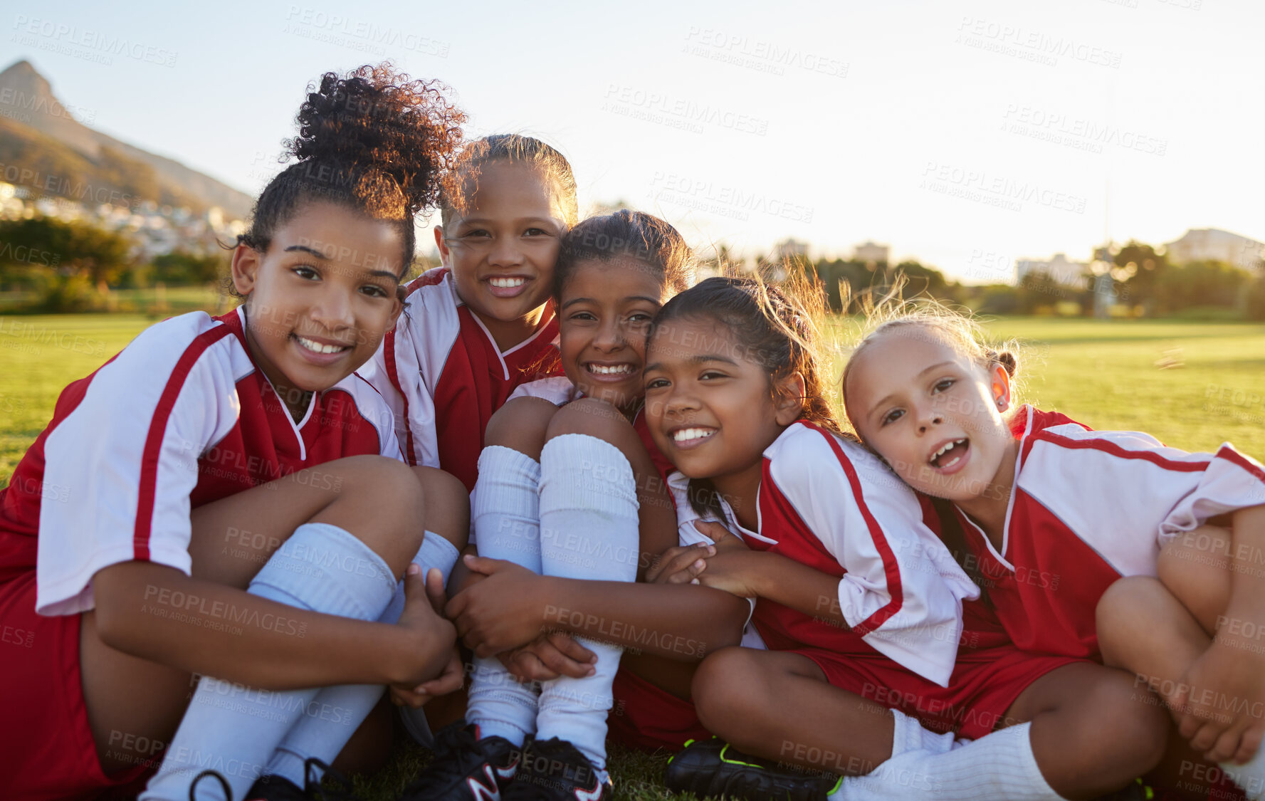 Buy stock photo Team, soccer or happy sports girl with smile on field, grass or stadium for health, teamwork or wellness portrait. Children, football or exercise with support, diversity or motivation for sports game