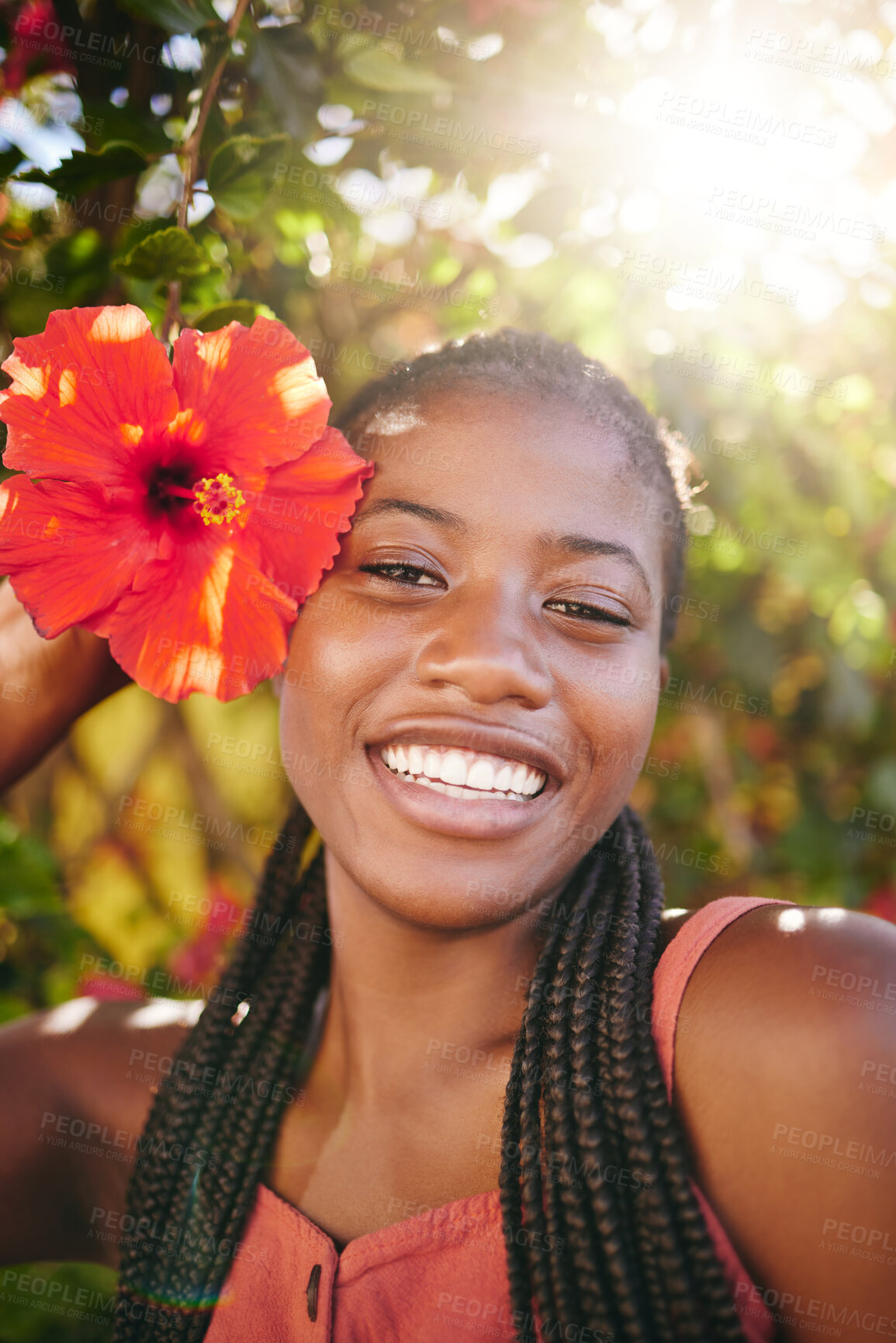 Buy stock photo Beauty, flower and flare portrait of black woman happy, smile and enjoy Summer holiday or vacation in Jamaica. Happiness, skincare and wellness girl at peace, freedom or relax in outdoor nature park