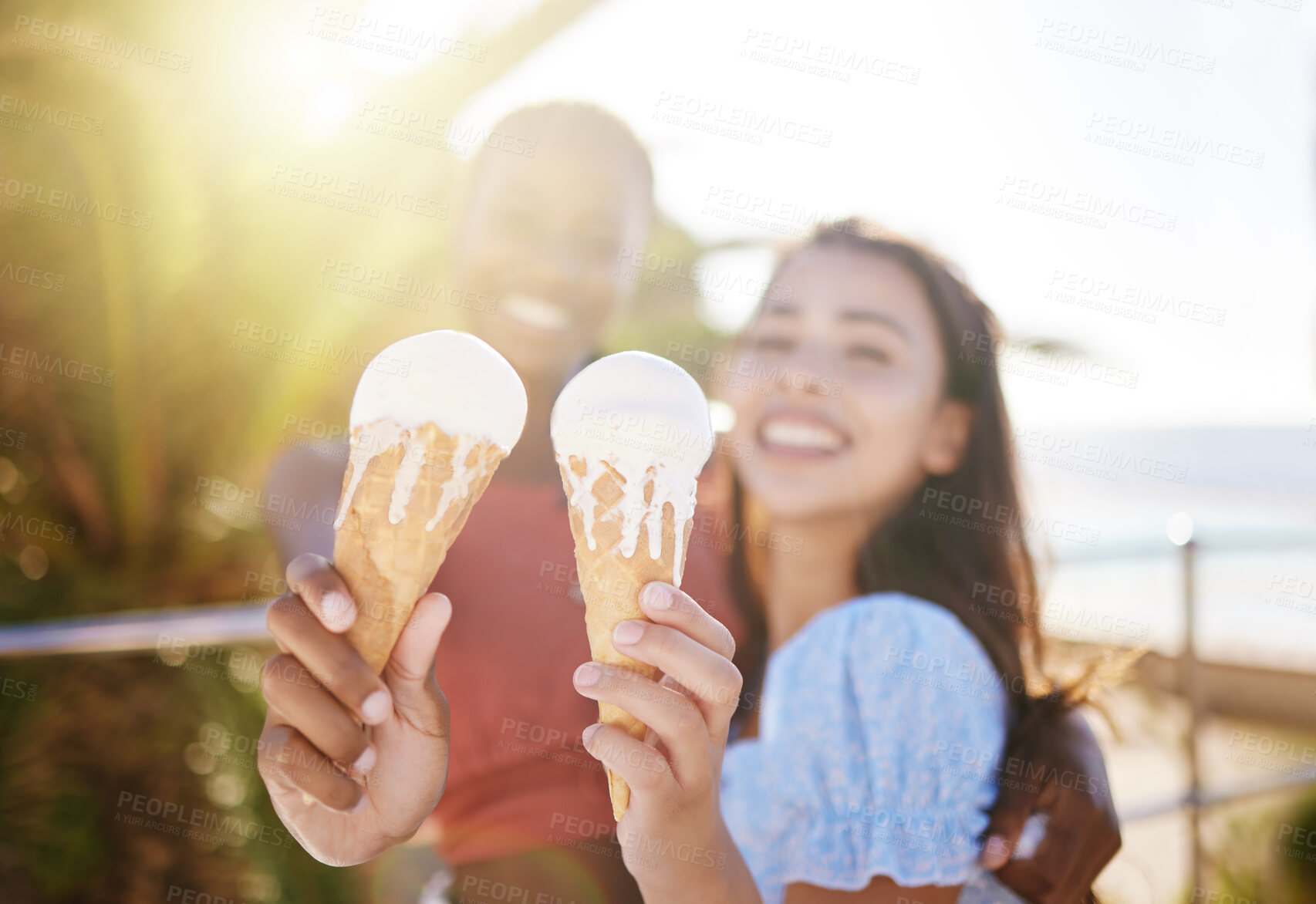 Buy stock photo Ice cream, hands and women friends in city, outdoors or town having fun spending summer vacation time together. Diversity, love and lesbian couple or girls hug while eating gelato on date or walk.