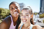 Interracial woman, friends and selfie smile for sports health, workout and exercise together in the city. Portrait of happy athletic women smiling in happiness for friendship photo in a urban town
