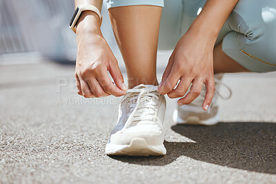 Buy stock photo Shoes, feet and woman running in the street for fitness, cardio and marathon training in the city of Toronto. Shoelace of athlete runner ready for health workout, exercise and sports in the road