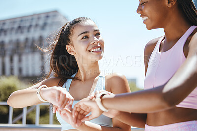 Buy stock photo Watch, fitness motivation and friends running for cardio fitness in the city of Orlando together. African runner and women happy about sports training time on digital clock after workout in summer