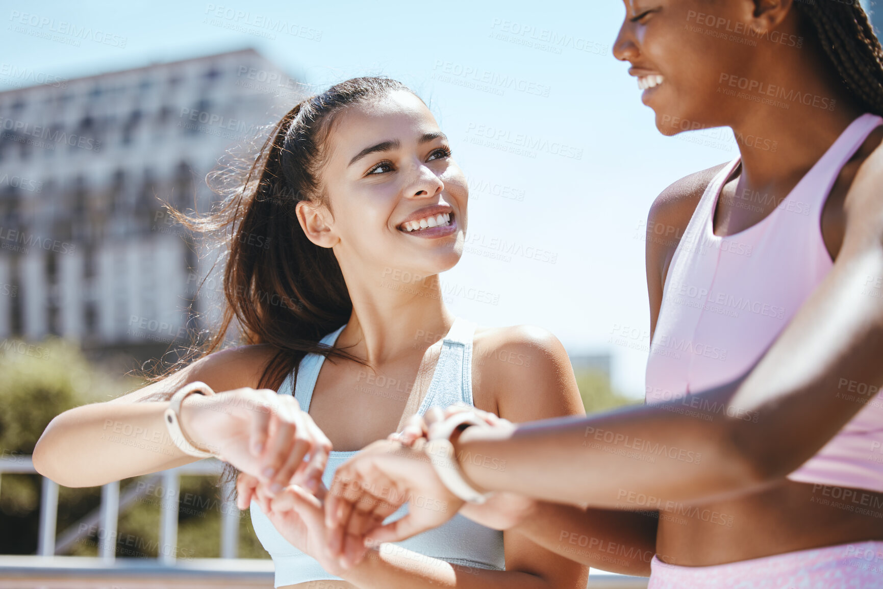 Buy stock photo Watch, fitness motivation and friends running for cardio fitness in the city of Orlando together. African runner and women happy about sports training time on digital clock after workout in summer