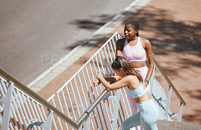 Buy stock photo Fitness, exercise and friends stretching on stairs before running in a city together, wellness and cardio. Training, women and workout practice by girls bonding and relax, discussing run routine