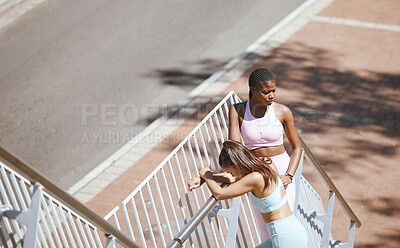 Buy stock photo Women, tired and relax in stairs workout, training and exercise in New York city for health, wellness and heart cardio. Friends, runners and sports people on steps for running or urban fitness break