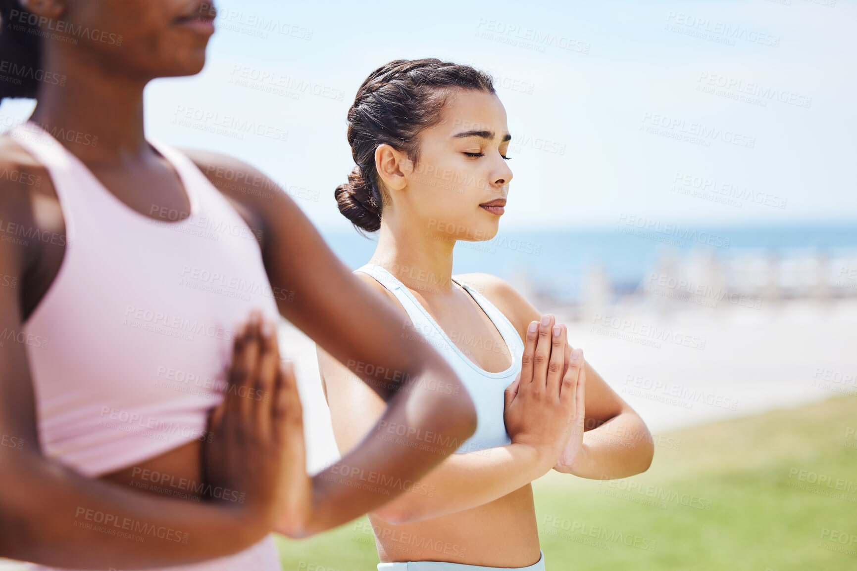 Buy stock photo Women, yoga and prayer pose in park, nature or outdoors meditation, fitness or stretching. Zen, relax and females practicing pilates for health, mindfulness and wellness together on grass outside.
